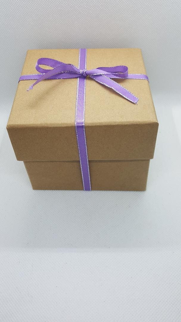 gift box with purple ribbon