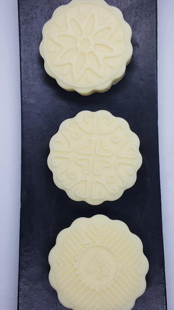 lotion bars on a wooden tray