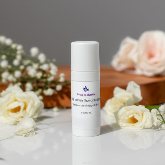 dandelion flower lotion tube on a table with white flowers