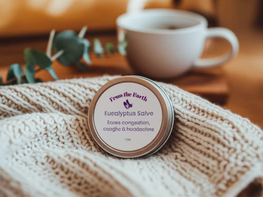 eucalyptus salve tin on a blanket with a cup  of tea