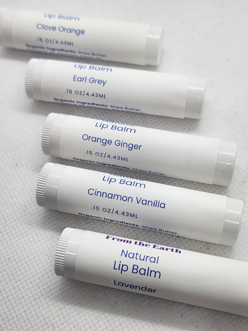 several lip balms on a white background